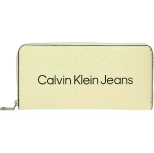 Calvin Klein Jeans Peněženka pastelově žlutá / černá